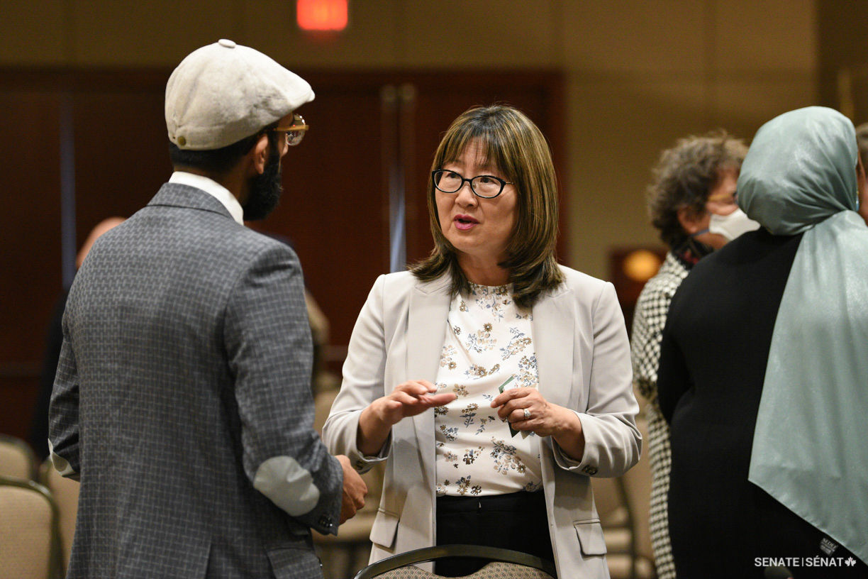 Senator Yonah Martin speaks with Omar Yaqub of the Islamic Family & Social Services Association following public hearings in Edmonton.