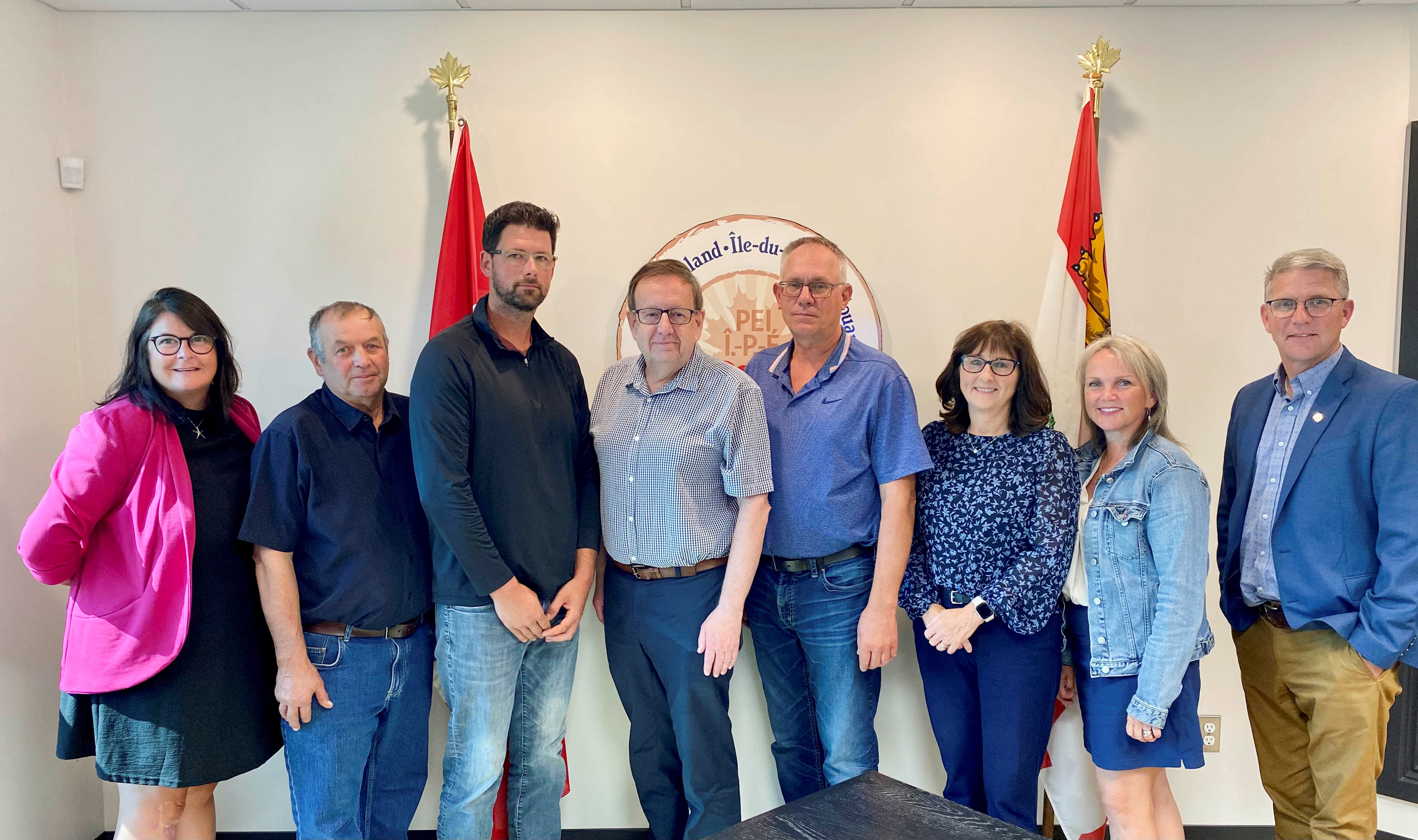 Senators Percy E. Downe, Jane MacAdam and Mary Robinson pose with executive and staff members of the PEI Potato Board.