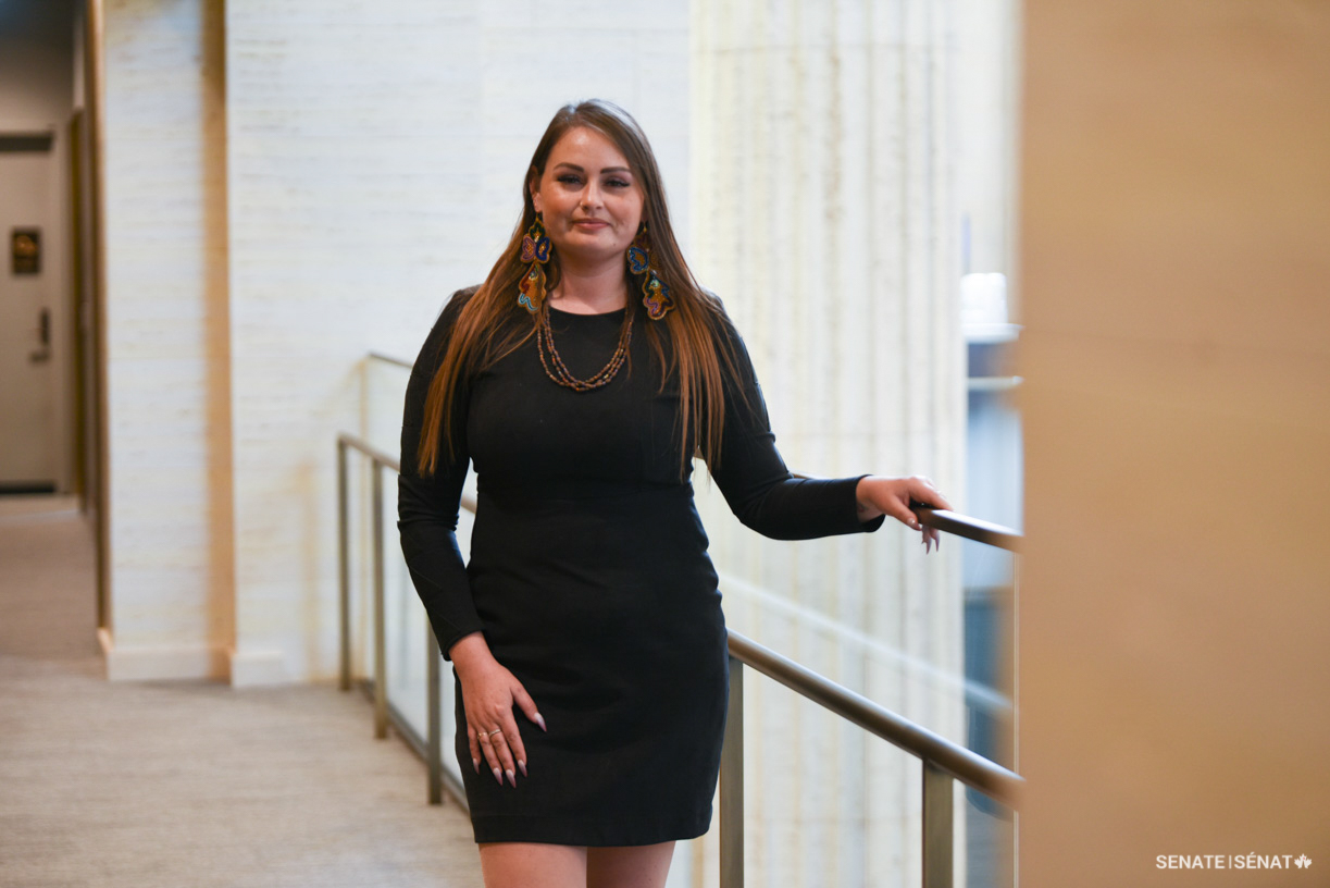 Voices of Youth Indigenous Leaders 2022 participant Gabrielle Fayant poses in the Senate of Canada Building.