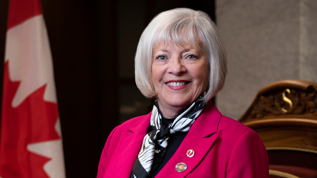 Senator Nancy J. Hartling poses in the Senate Chamber.