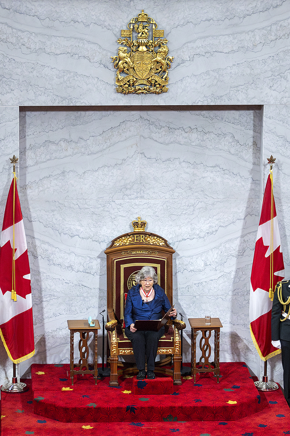 Governor General Arbour gives her first viceregal speech from the monarch’s throne in the Senate Chamber, beneath the Coat of Arms of Canada. (Photo credit: Department of Canadian Heritage)