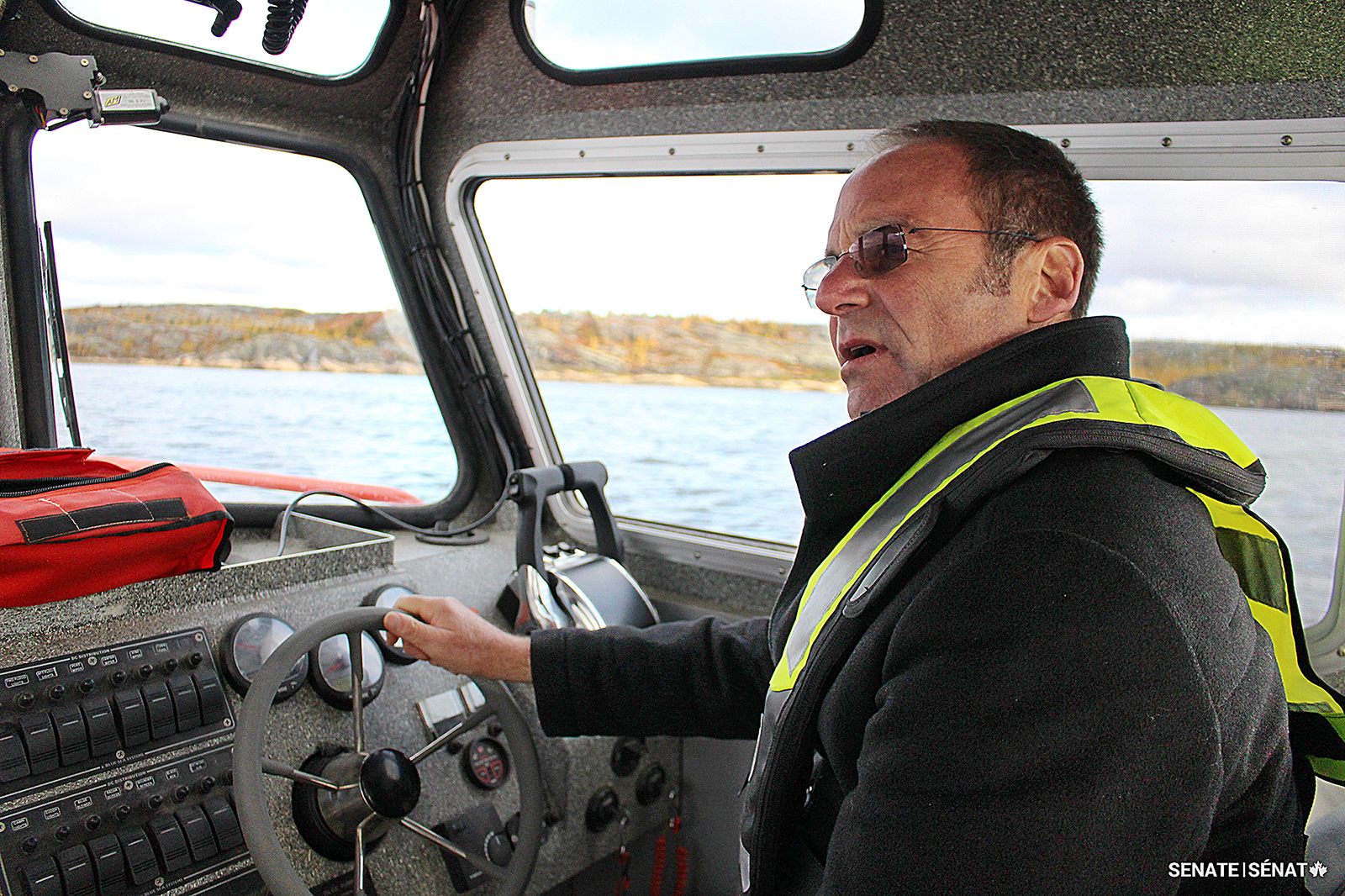 Senator Gold, then deputy chair of the Senate Committee on Fisheries and Oceans, takes the wheel of a fast rescue craft during a fact-finding mission to Kuujjuuaq, Quebec in 2018.