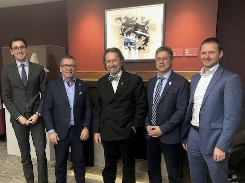 Tuesday, November 29, 2022 - Senator Dennis Dawson, centre, meets with members of the Association of Canadian Port Authorities to discuss the port industry in Canada. From left to right, Martin Imbleau, CEO, Port of Montréal; Mario Girard, CEO, Port of Québec; Senator Dawson; Pierre Gagnon, CEO, Port of Sept-Îles; and Carl Laberge, CEO, Port of Saguenay.