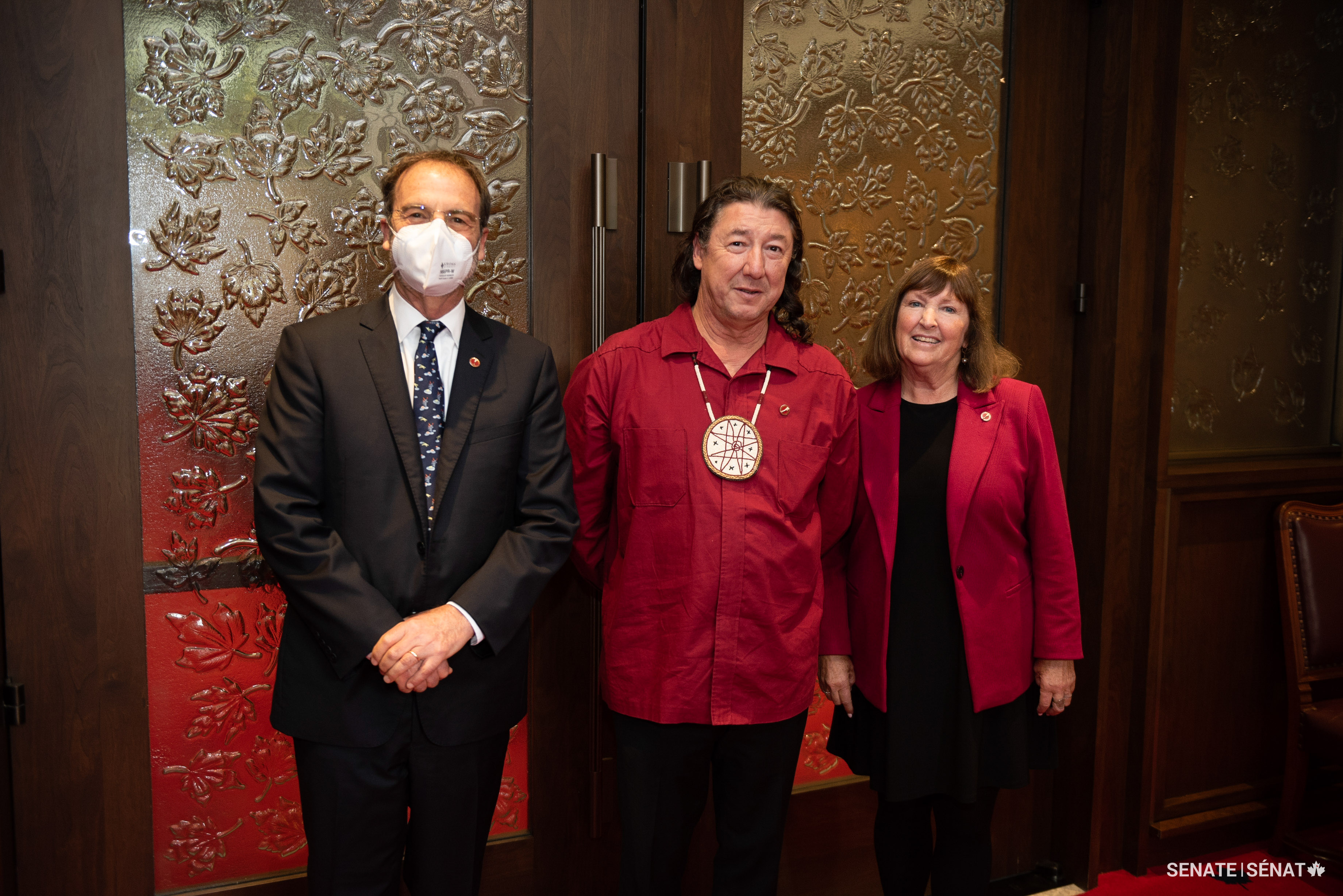 Senator Marc Gold, left, stands with senators Paul J. Prosper and Mary Coyle ahead of Senator Prosper’s swearing-in ceremony on September 19, 2023.