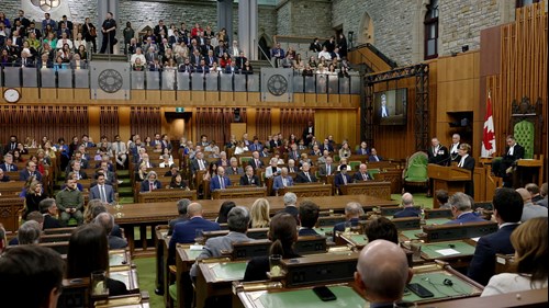 Speaker of the Senate Raymonde Gagné addresses senators and MPs and Ukraine President Volodymyr Zelenskyy in a packed House of Commons.