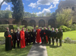 A group of dignitaries in formal and religious attire pose for a photo in Vatican City, Rome, Italy.