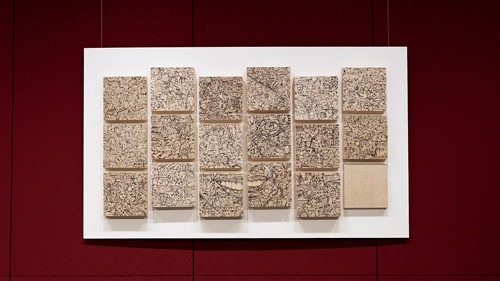 Canada’s Self Portrait, an ink piece comprised of 18 birch panels, by Aquil Virani and Rebecca Jones.