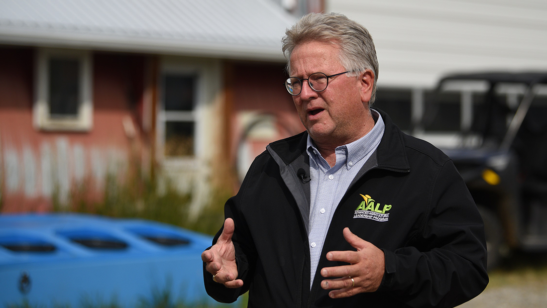 Senator Rob Black speaks while on a visit to a farm.