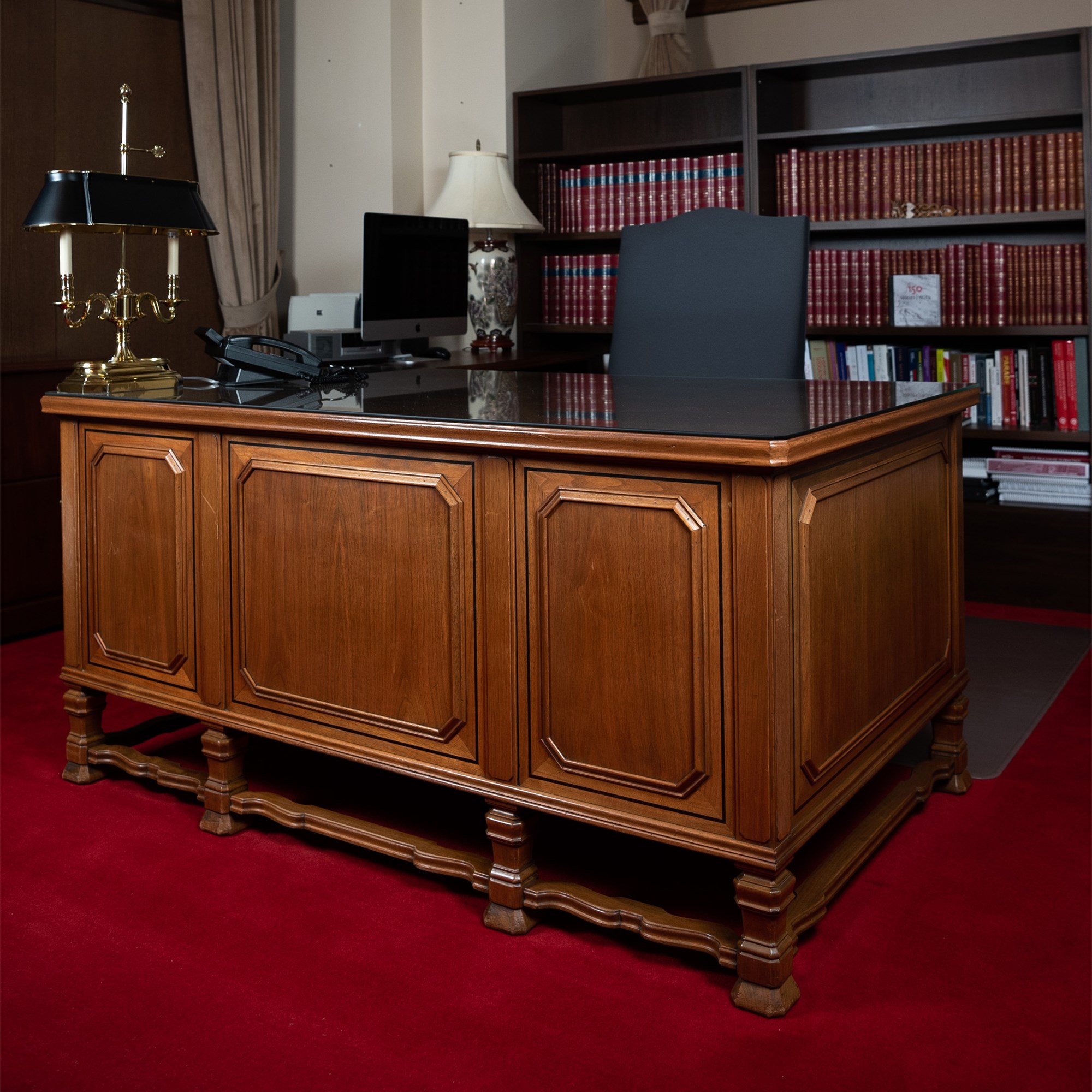 The Senate Speaker’s desk features three panels on the front. 