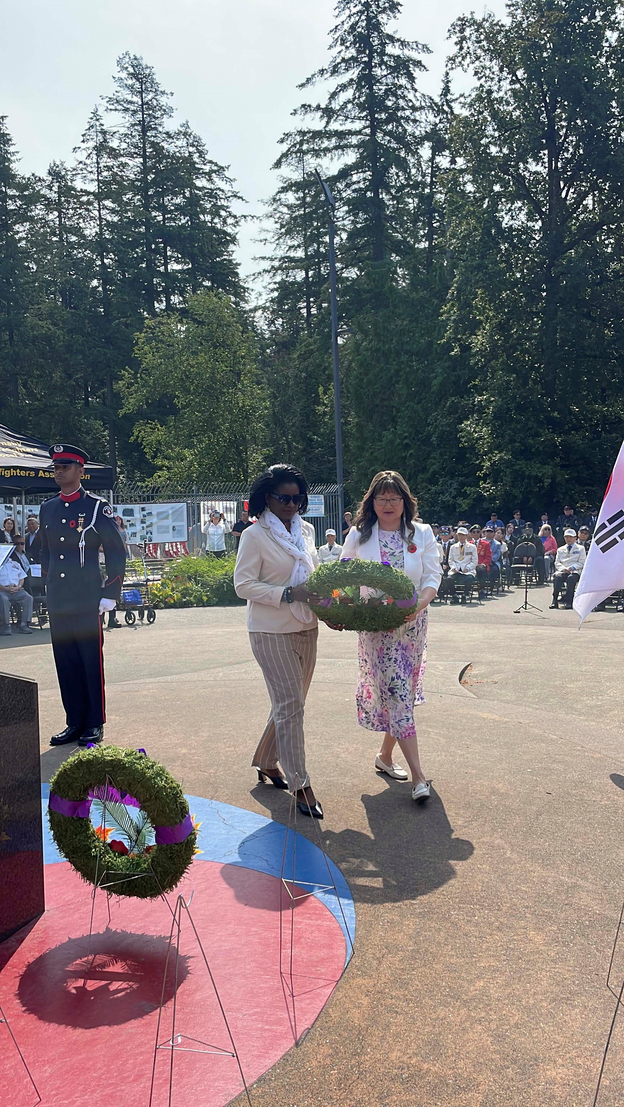 Saturday, July 27, 2024 – Senators Yonah Martin, right, and Amina Gerba, left, lay a wreath on behalf of the Senate at the annual Korean War Veterans Day ceremony (as enacted by Senator Martin’s Bill S-213 in 2013); Korean War Memorial, Burnaby, BC.