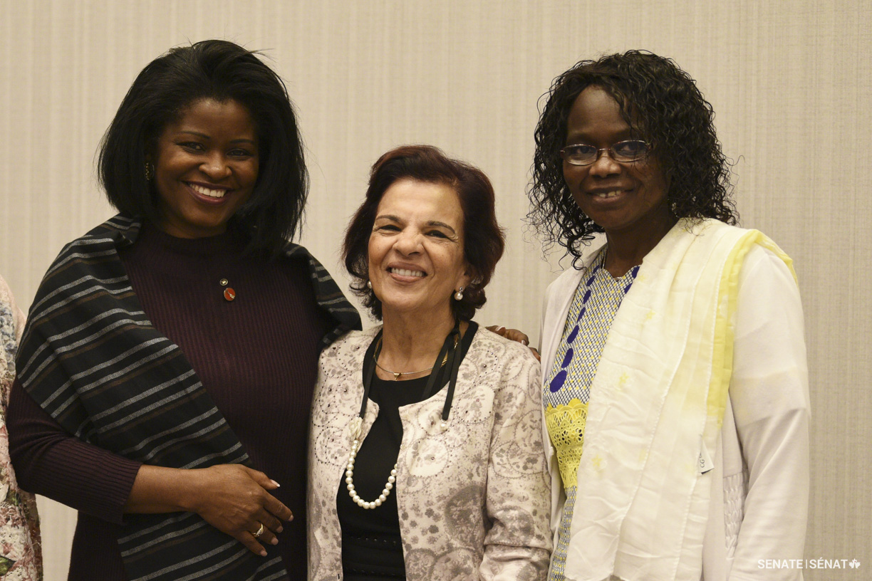 From left, senators Amina Gerba and Mobina S. B. Jaffer connect with Thérèse Sagna, board member of the Quebec Women’s Federation. Ms. Sagna testified before the human rights committee on Tuesday, September 20, 2022, during public hearings in Québec City.
