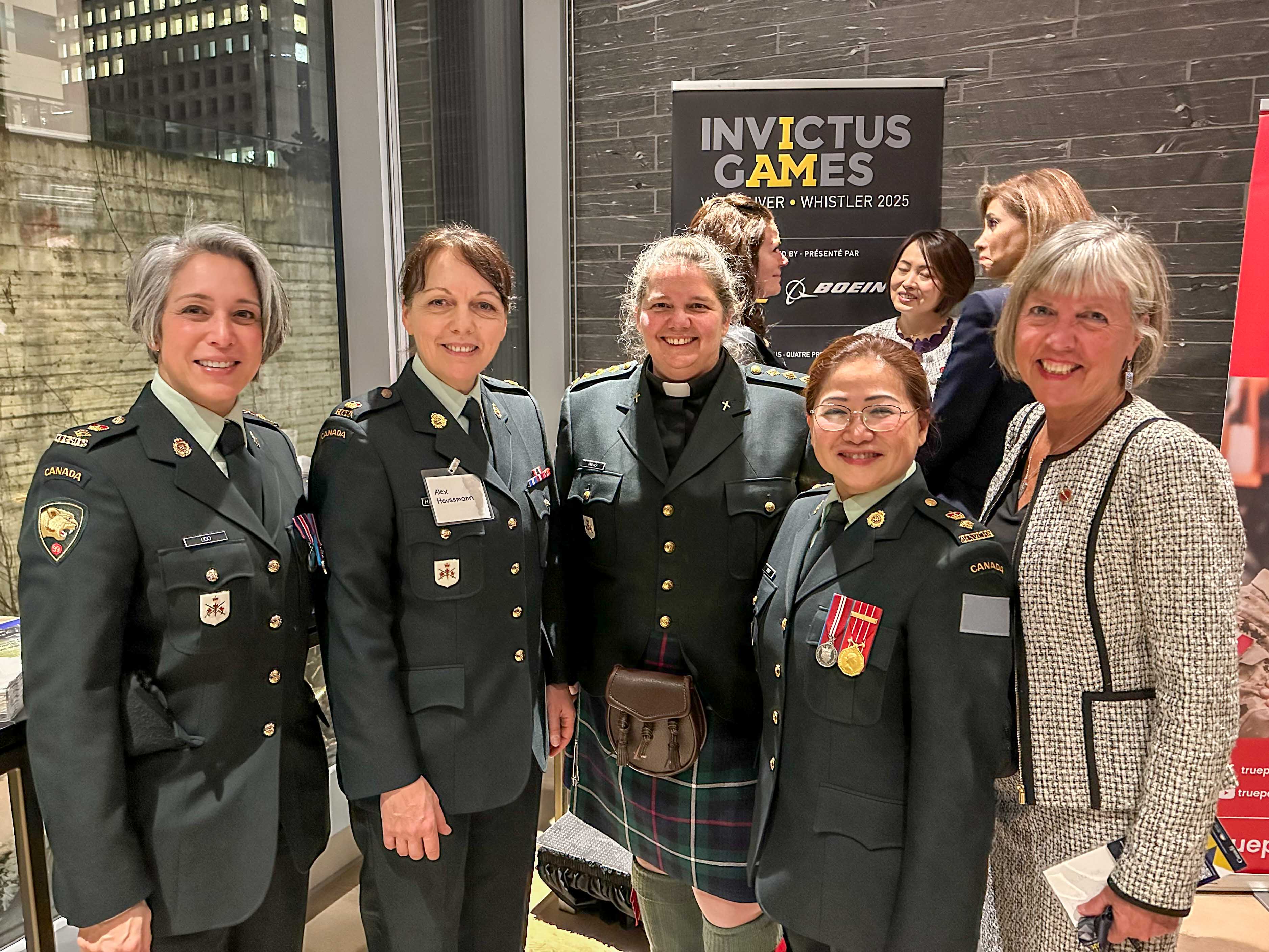 Friday, February 7, 2025 – Senator Marty Deacon, right, with members of the Canadian Armed Forces; Invictus Games; Invictus Village; Vancouver, British Columbia.
