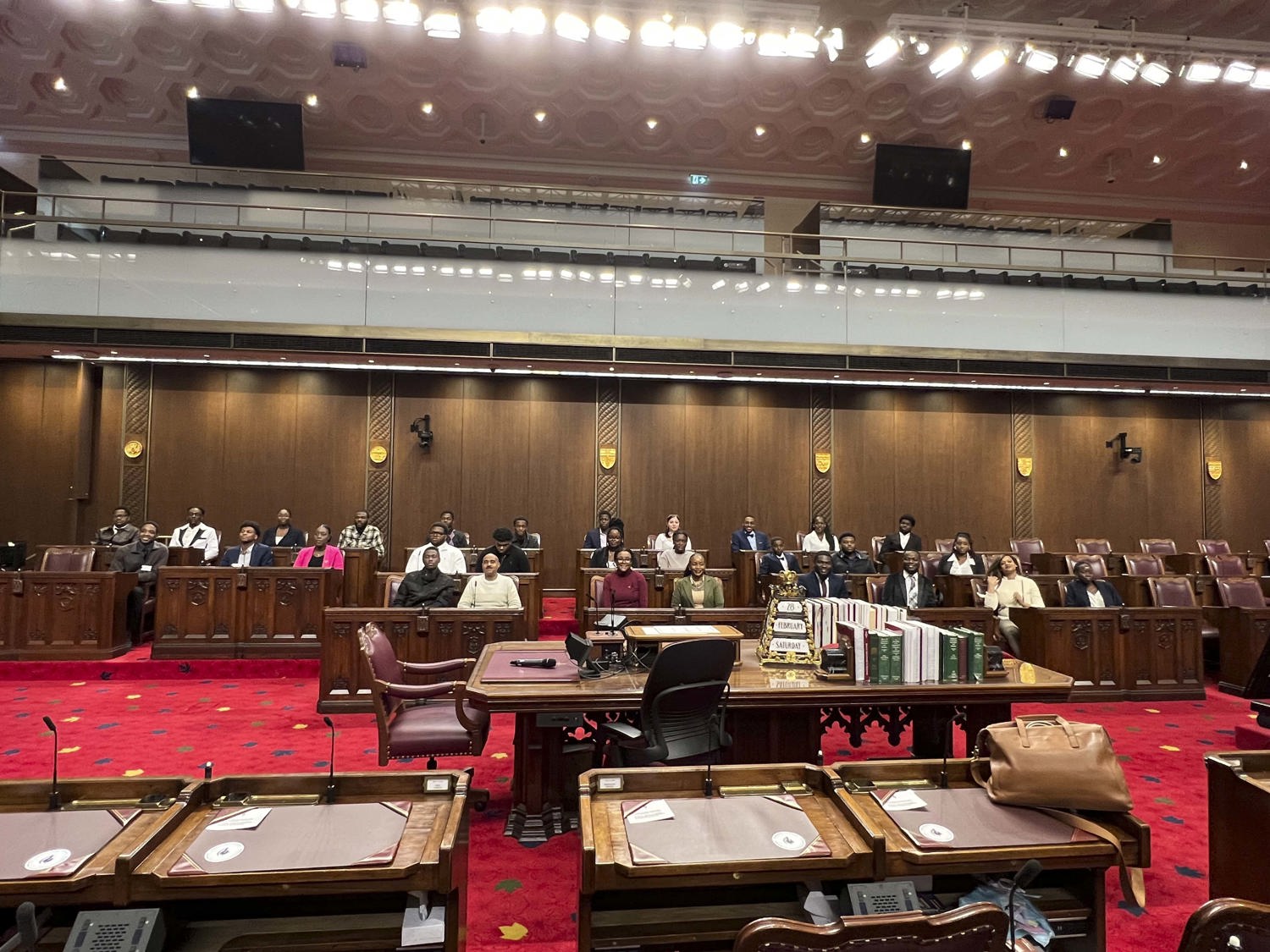 A group of people in the Senate Chamber.