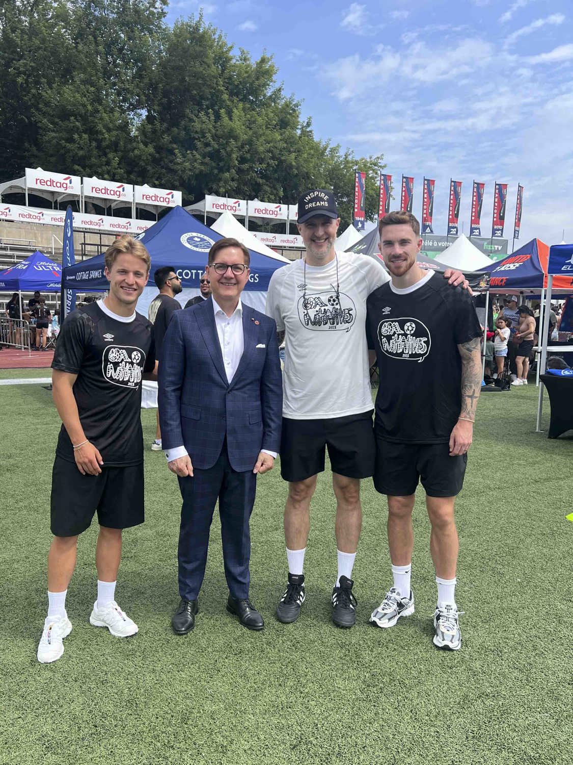 Sunday, July 27, 2025 – Senator Tony Loffreda, second left, Paul Desbaillets, organizer of Goalmtl and founder of the Goal Initiatives Foundation, second from right; Goalmtl Soccer Festival, tournament and fundraiser; Stade McGill, Montréal, Quebec.
