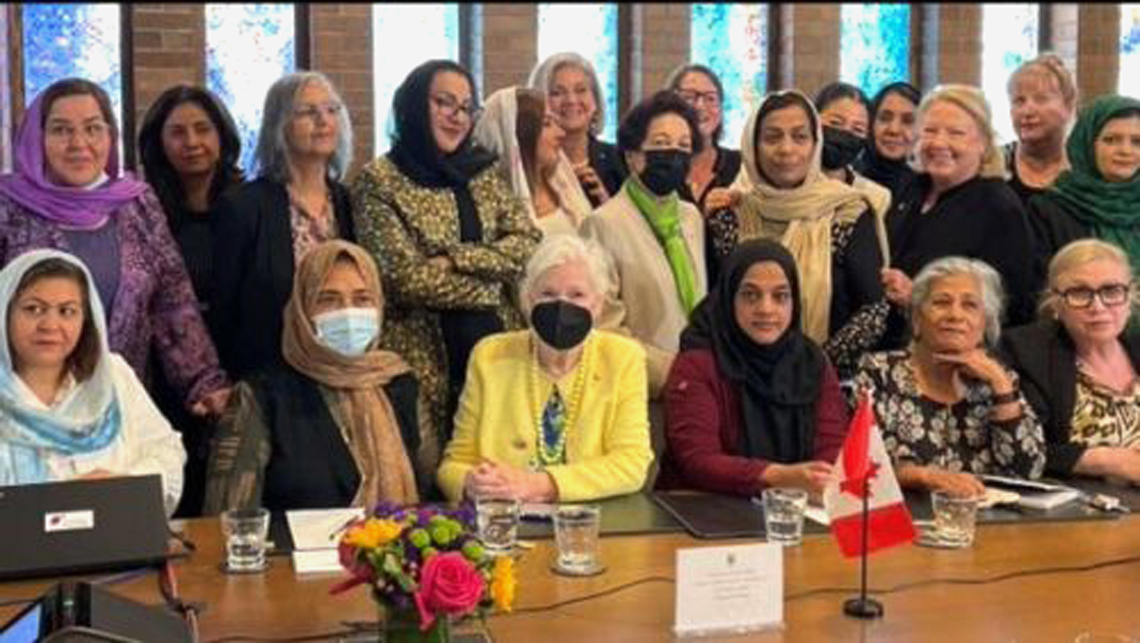 Tuesday, June 28, 2022 – Senator Ratna Omidvar (sitting, second to the right) attends a roundtable discussion in Toronto between women leaders of Canada and Afghanistan, including the Honourable Elizabeth Dowdeswell, Lieutenant Governor of Ontario (front centre). They explored how to support the leadership journeys of Afghan women leaders who have already settled in Canada. Massey College, the Canadian Association of Former Parliamentarians and the Canadian Association of Feminist Parliamentarians hosted the event with the help of Senator Marilou McPhedran.
