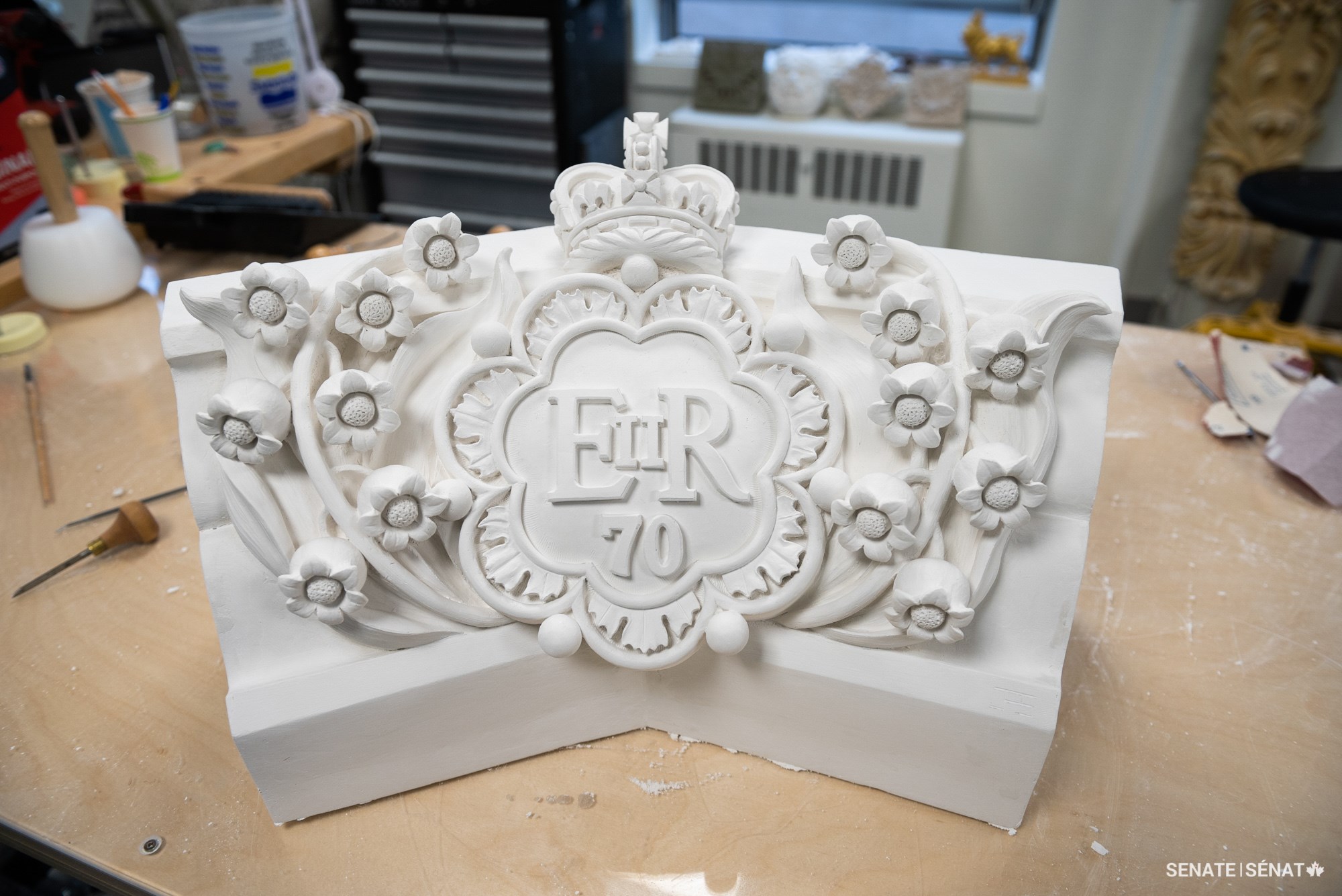 A durable plaster maquette is cast from the silicone mould — the last step before carving in stone.