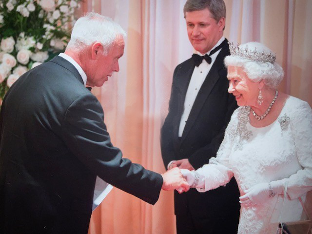Caption:  Provide source information if it is not a Senate image.  Identify everyone in the photo — full name, honorifics if applicable.	Before his appointment to the Senate, Senator Dagenais met with Queen Elizabeth II during her official visit to Canada in 2010. Then-prime minister Stephen Harper is also in the photo. (Photo credit: Office of Senator Jean-Guy Dagenais)