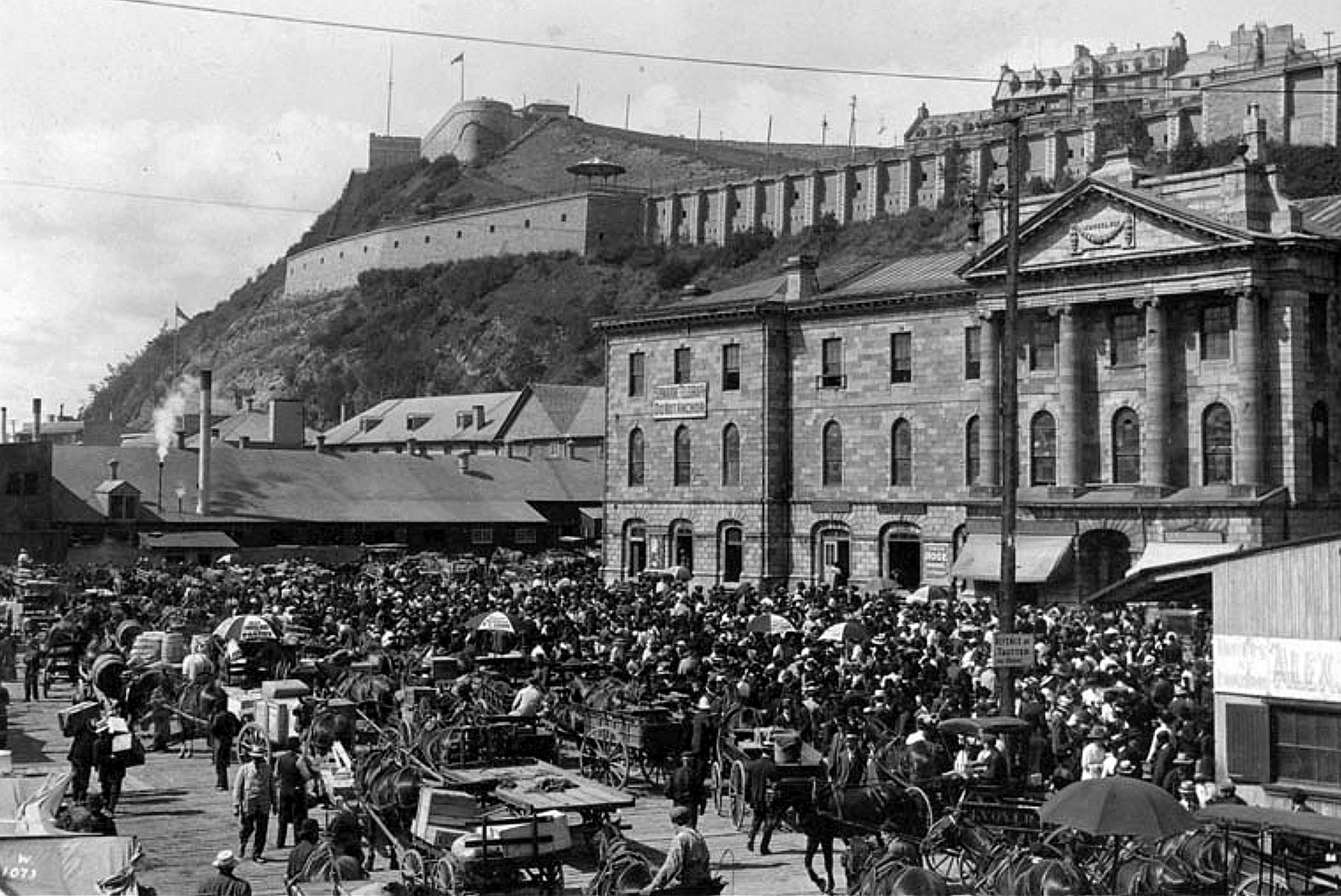 Québec’s Champlain Market in the late 1800s, looking towards Dufferin Terrace and the Citadel.