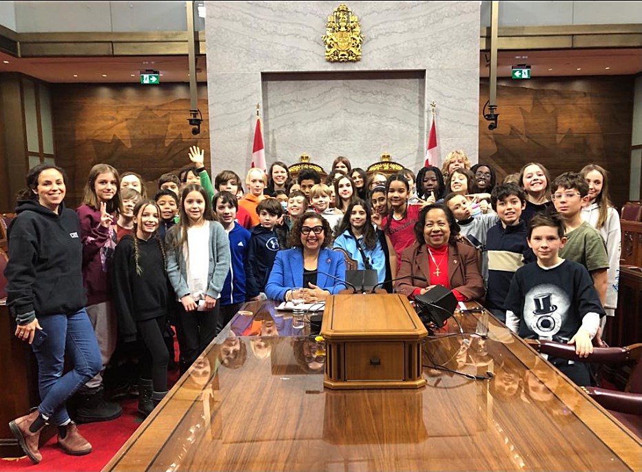 Monday, January 29, 2024 – Senators Bernadette Clement and Marie-Françoise Mégie, seated from left to right; tour of the Senate Chamber with students from Charles-Sauriol Elementary School; Senate of Canada Building, Ottawa, Ontario.