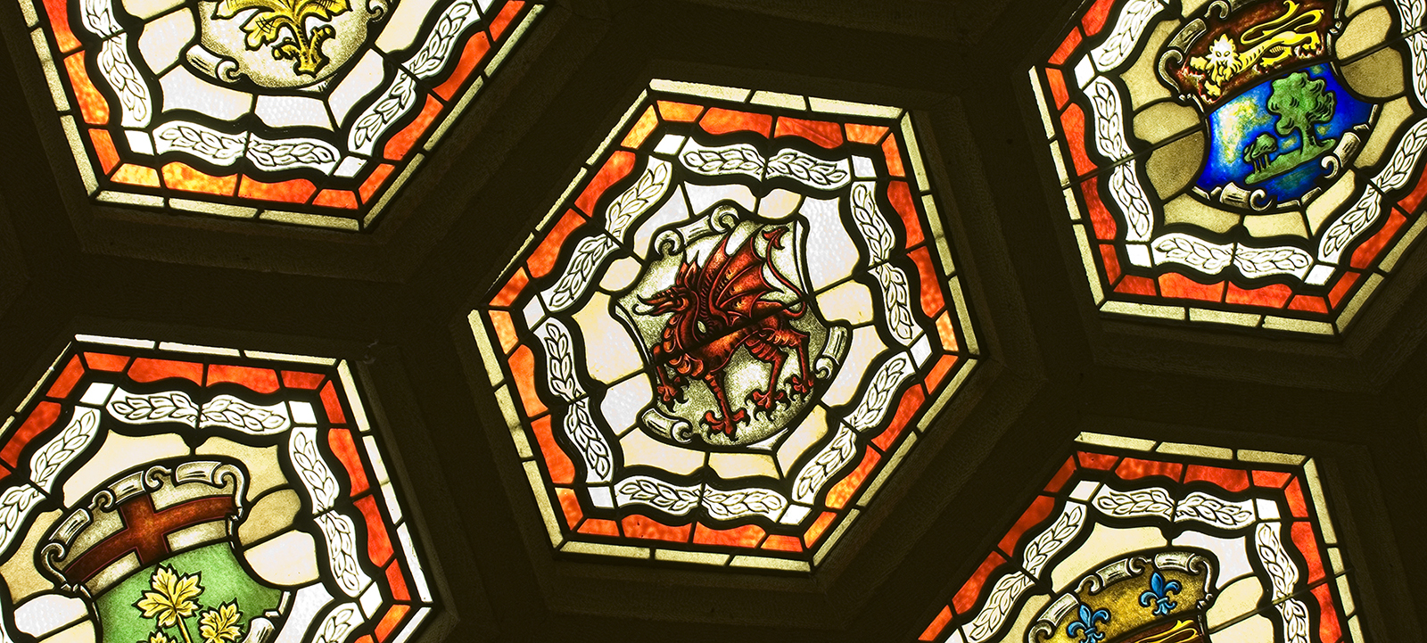 The Welsh Red Dragon is depicted on a hexagonal panel in the stained-glass ceiling of Centre Block’s Senate foyer.