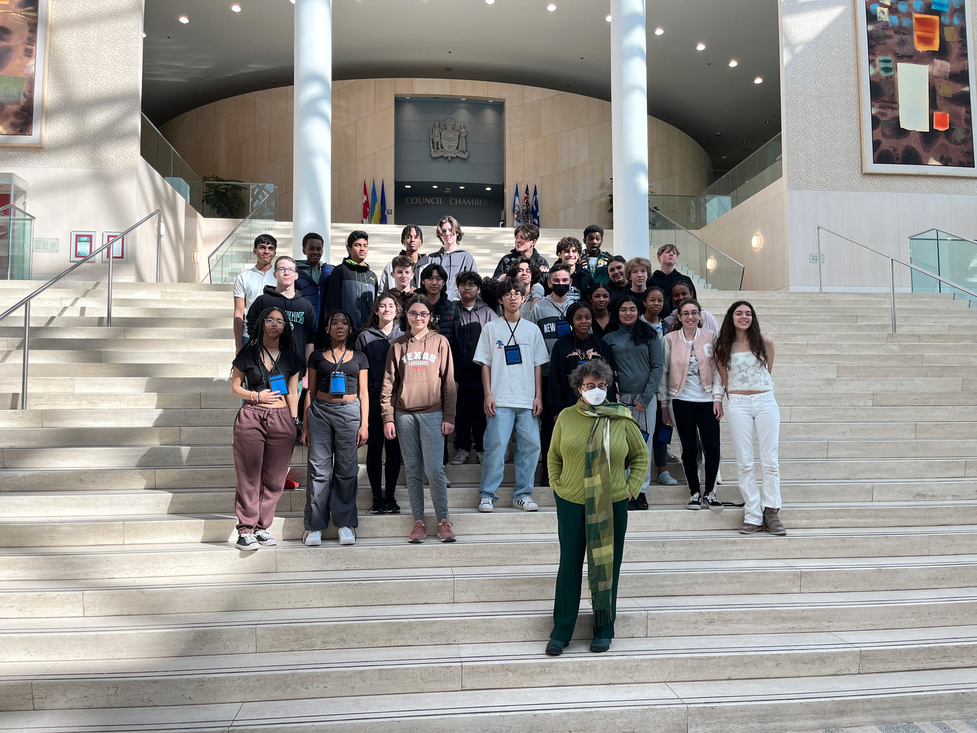 Wednesday, April 12, 2023 – Senator Paula Simons, front, visits Edmonton City Hall with Grade 9 students from J. J. Bowlen Catholic Junior High School and spoke about the Senate of Canada.