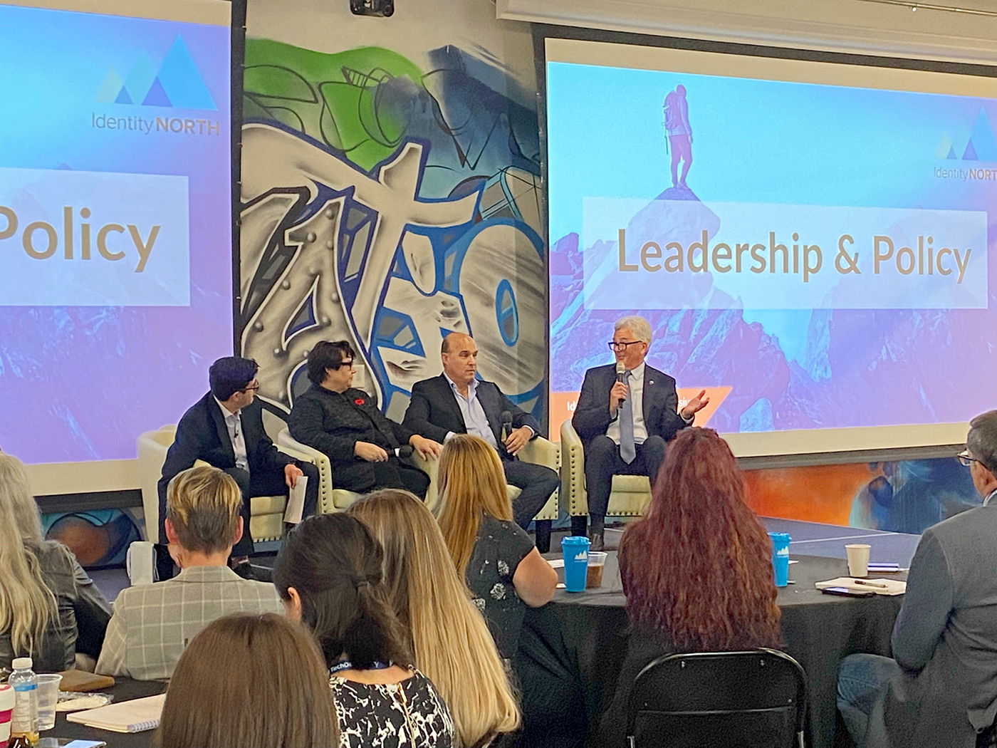 Wednesday, October 26, 2022 –Senator Colin Deacon, right, speaks on a panel about leadership and policy barriers during a symposium on the future of pan-Canadian digital governments, hosted by IdentityNORTH at Bayview Yards in Ottawa, Ontario. The senator shared the stage with moderator Sean Silcoff, technology reporter for The Globe and Mail, Debbi Gamble, chief officer of innovation and new ventures at Interac, and Jim Balsillie, co-founder of the Council of Canadian Innovators and CIO Strategy Council.